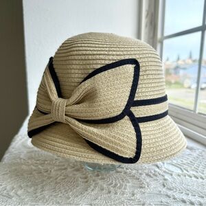 August Hat Company Straw Bucket Hat Bow Detail Beige Black Trim Coastal Chic